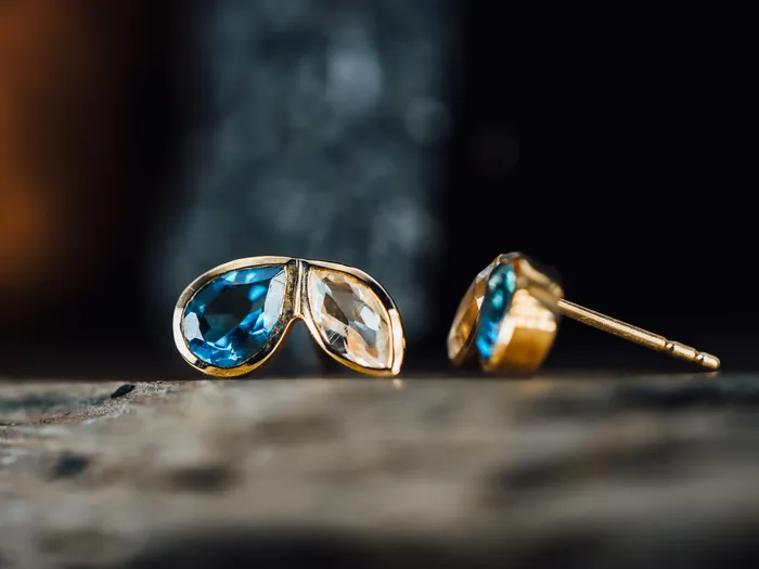 Earrings 14k Yellow Gold Blue Topaz and White Topaz Earrings Northwest Distributors